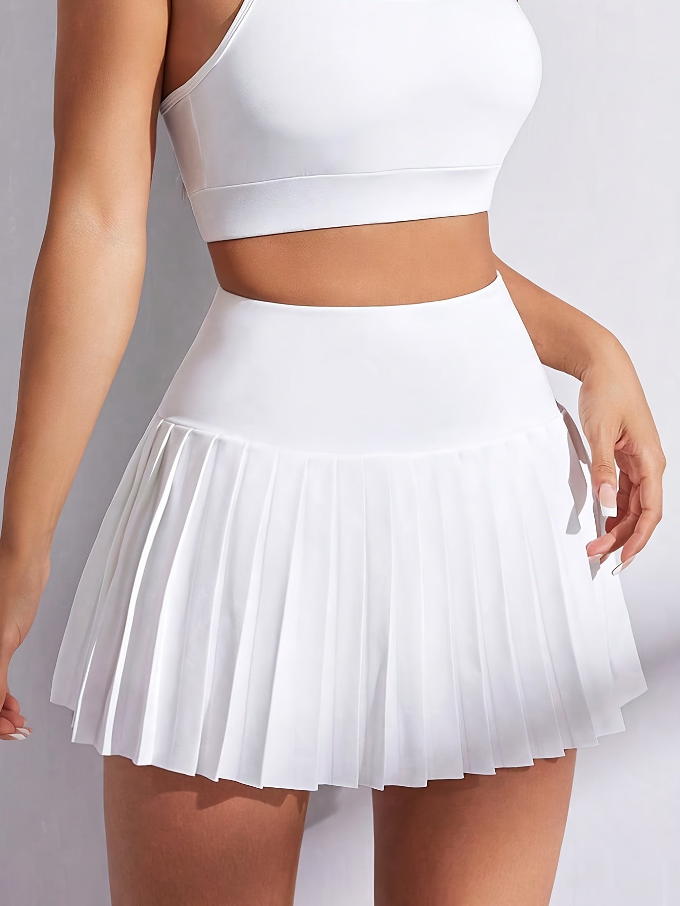 Chic High-Waisted Mini Skirt - Flattering Pleats, Versatile Solid Color, Perfect for Everyday & Athletic Wear